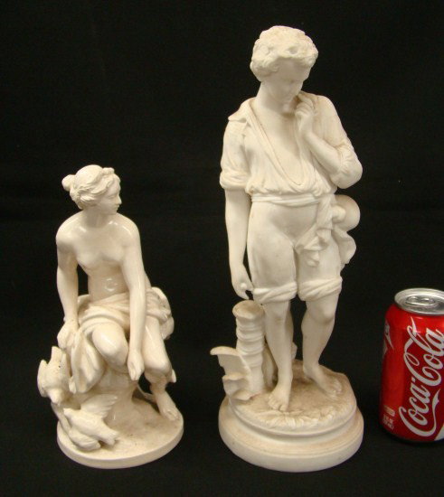 Parian Lot: Lot including 19th c. 13 1/2" Parian figure boy and 9 1/2" porcelain figure woman with birds.