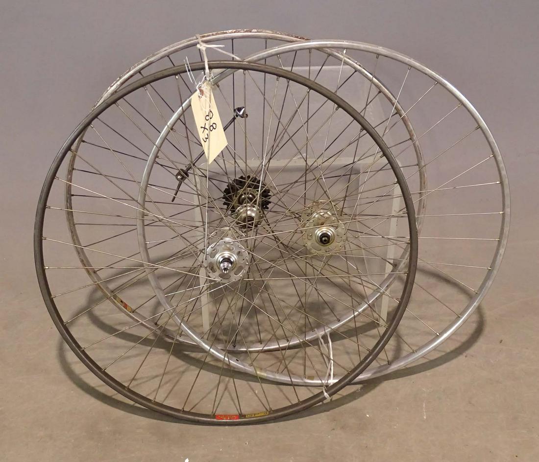 Tubular Racing Wheels: Three tubular racing wheels with Campagnolo Record hubs, (2) fronts and rear.