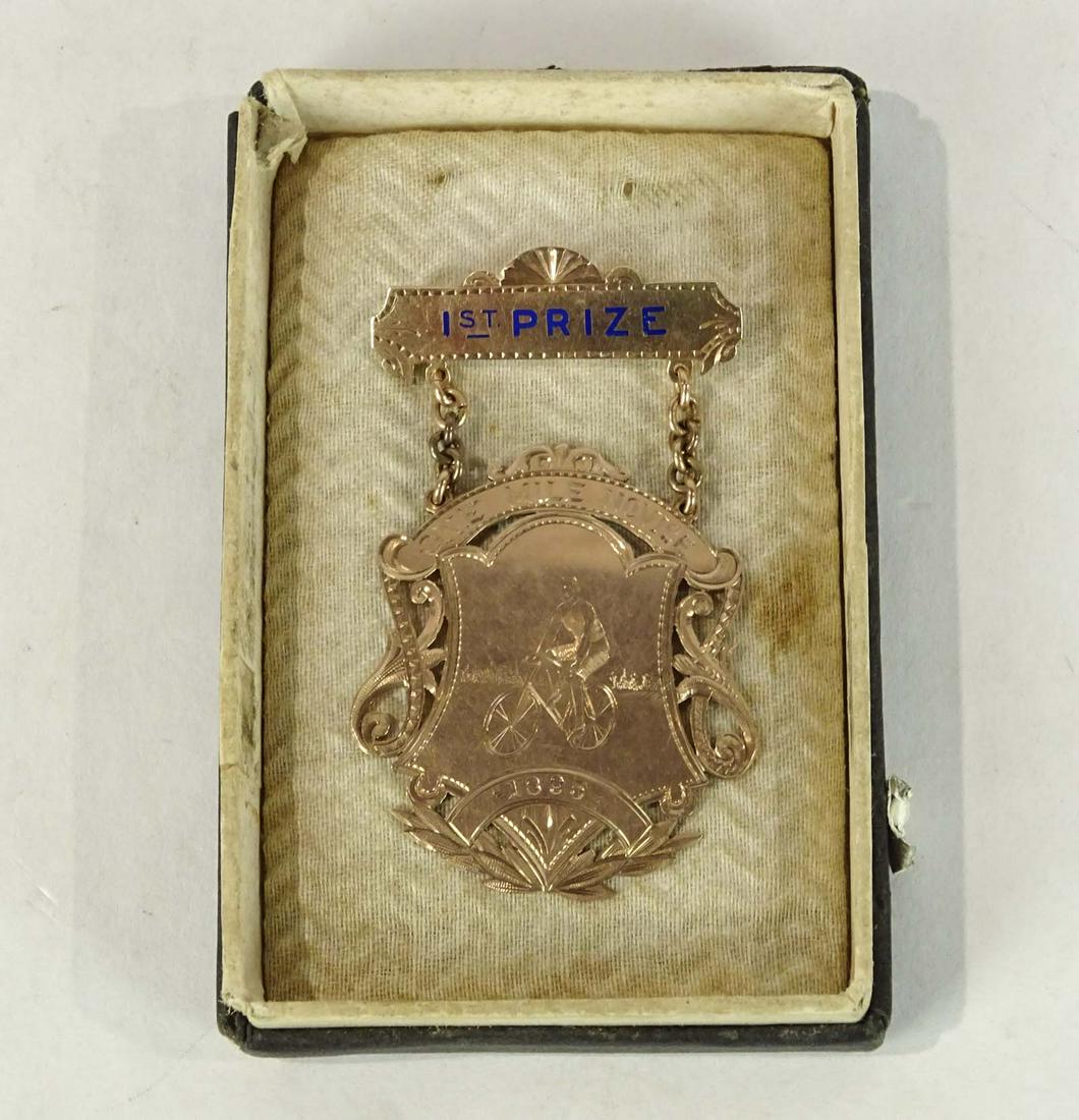 Gold Medal: Gold bicycle medal "1 Mile Michaganâ€¦1898". Good condition. Ex: Jim Carpenter Collection.