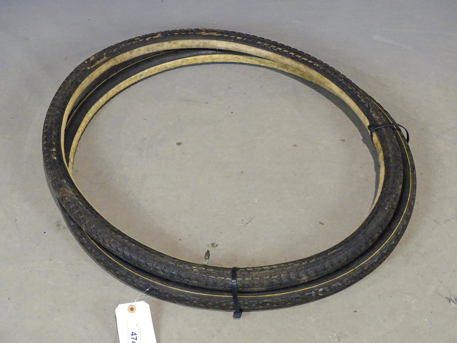 Tire Lot: Lot (2) vintage 28" Pneumatic tires.