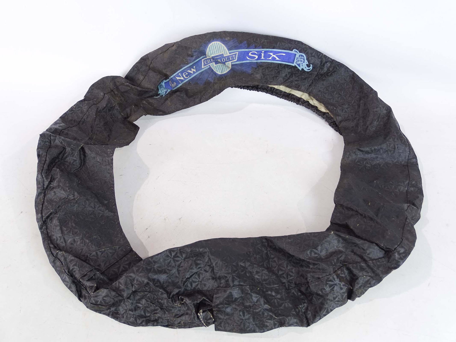 Chevrolet Six Spare Tire Cover: Chevrolet Six spare tire cover. Good condition.