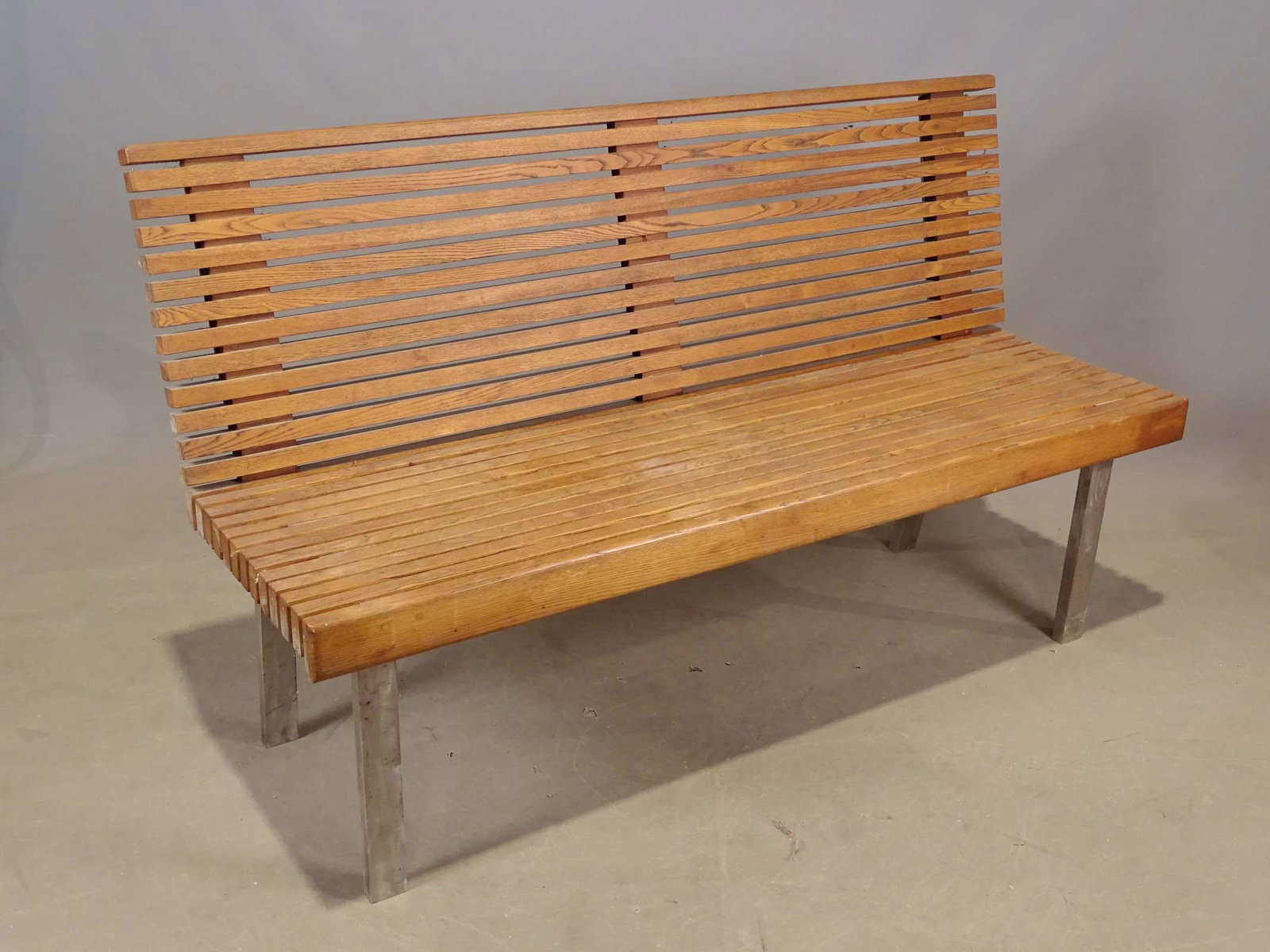 Bench: Ash and steel bench. 60" x 18" x 36".