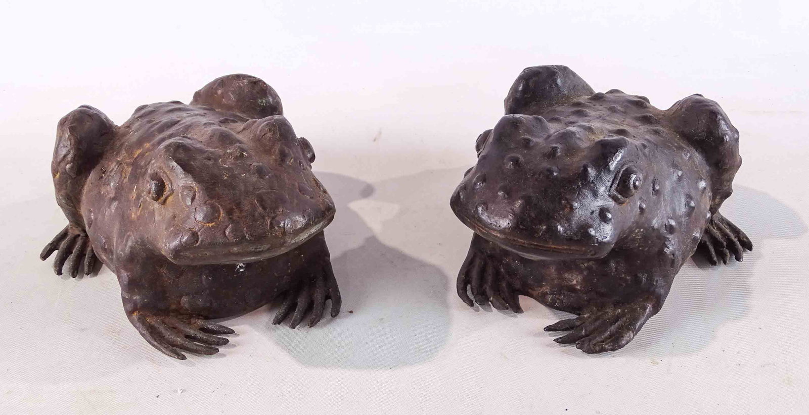Bronze Frogs: Two bronze frog sculptures. 9" x 5".