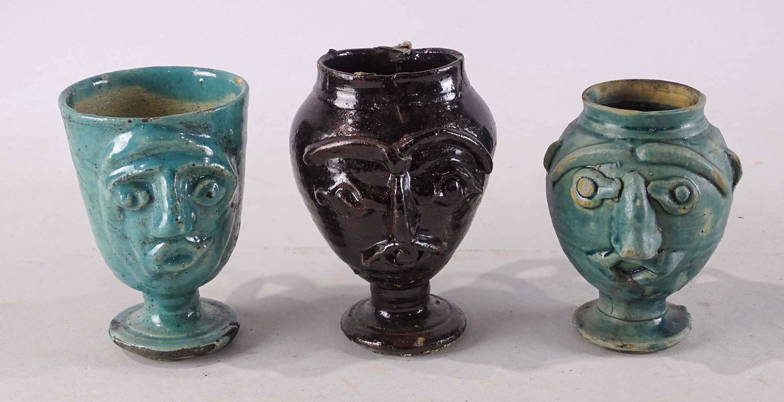 Pottery Face Mugs (1 of 6)
