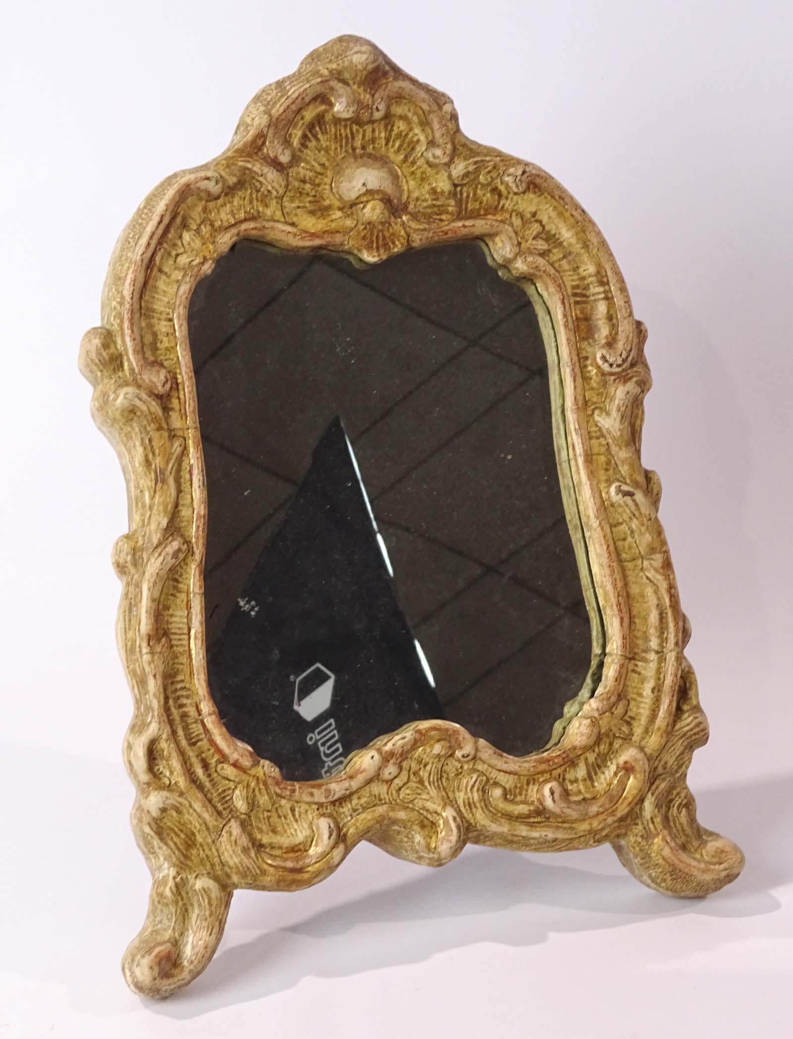 Rococo Table Mirror: Rococo table mirror with stand. Sweden C. 1760. 17" Ht., 12" W., 1" D.. Property of Cupboards and Roses, Great Barrington Mass..