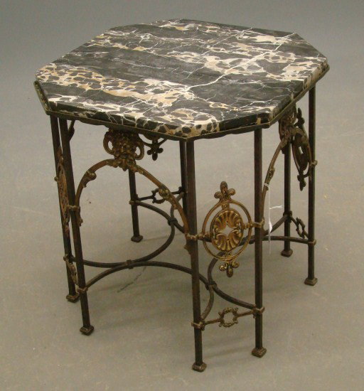 Decorative Marble Top Table: Decorative marble top wrought iron base table. Possibly Oscar Bach. Top 20" x 20", 21" Ht.