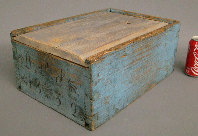 Candlebox: 19th c. candlebox in blue paint decorated with initials, stars and date 1852. Replaced lid. Otherwise all original. 16 1/2" x 7".