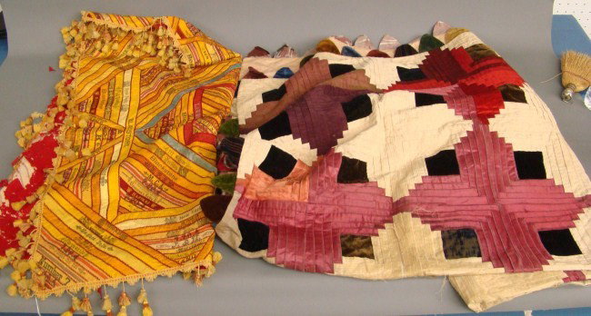 Textile Lot: Textile lot including 19th c. tobacco flags crib quilt and 19th c. log cabin quilt. Both damaged.