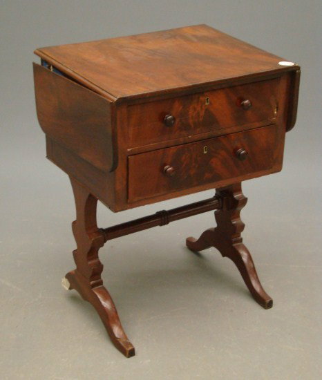 19th c. Stand: 19th c. mahogany two drawer stand. Piece of back foot missing. As found.