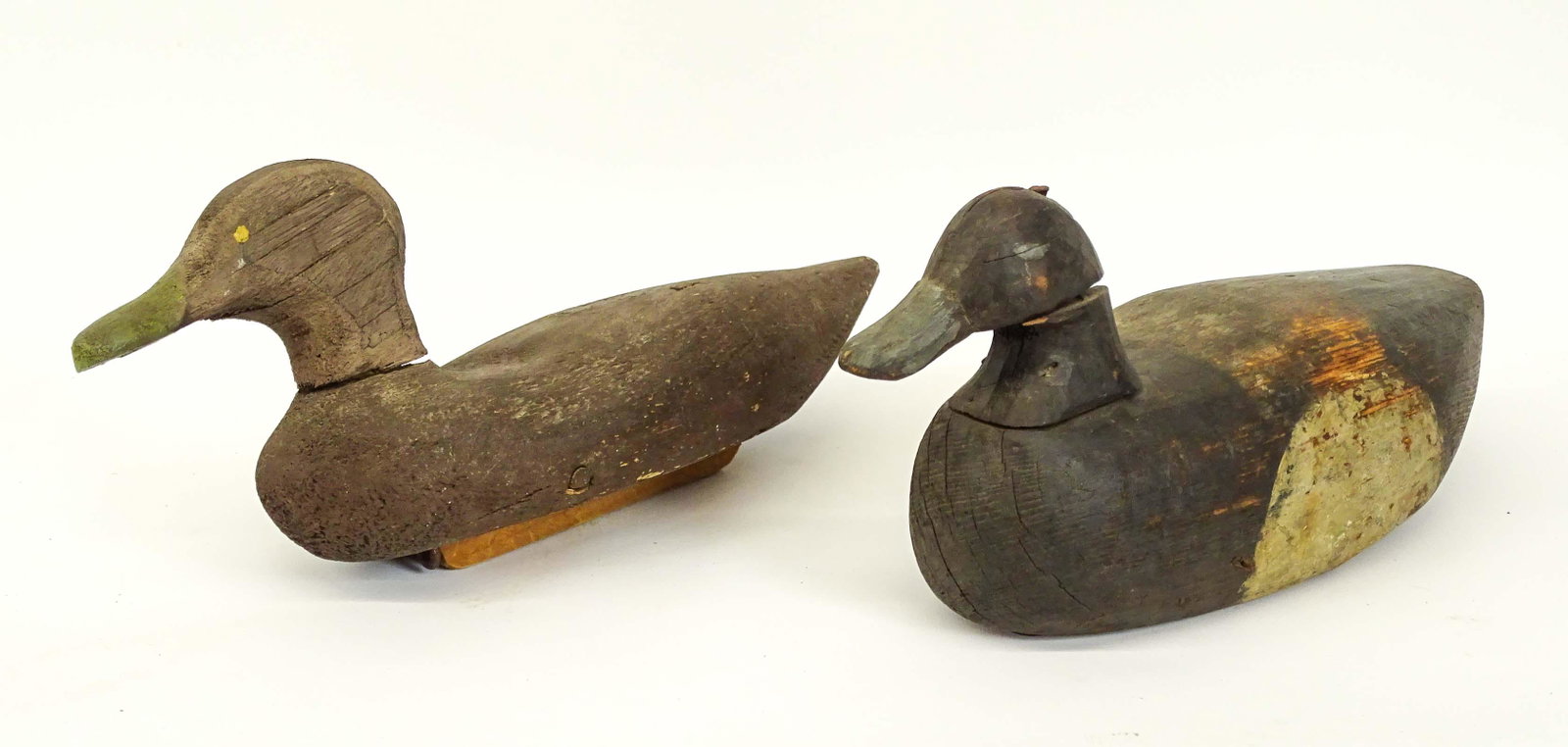 Decoy Lot: Lot (2) carved wooden decoys. Longest 12" L..