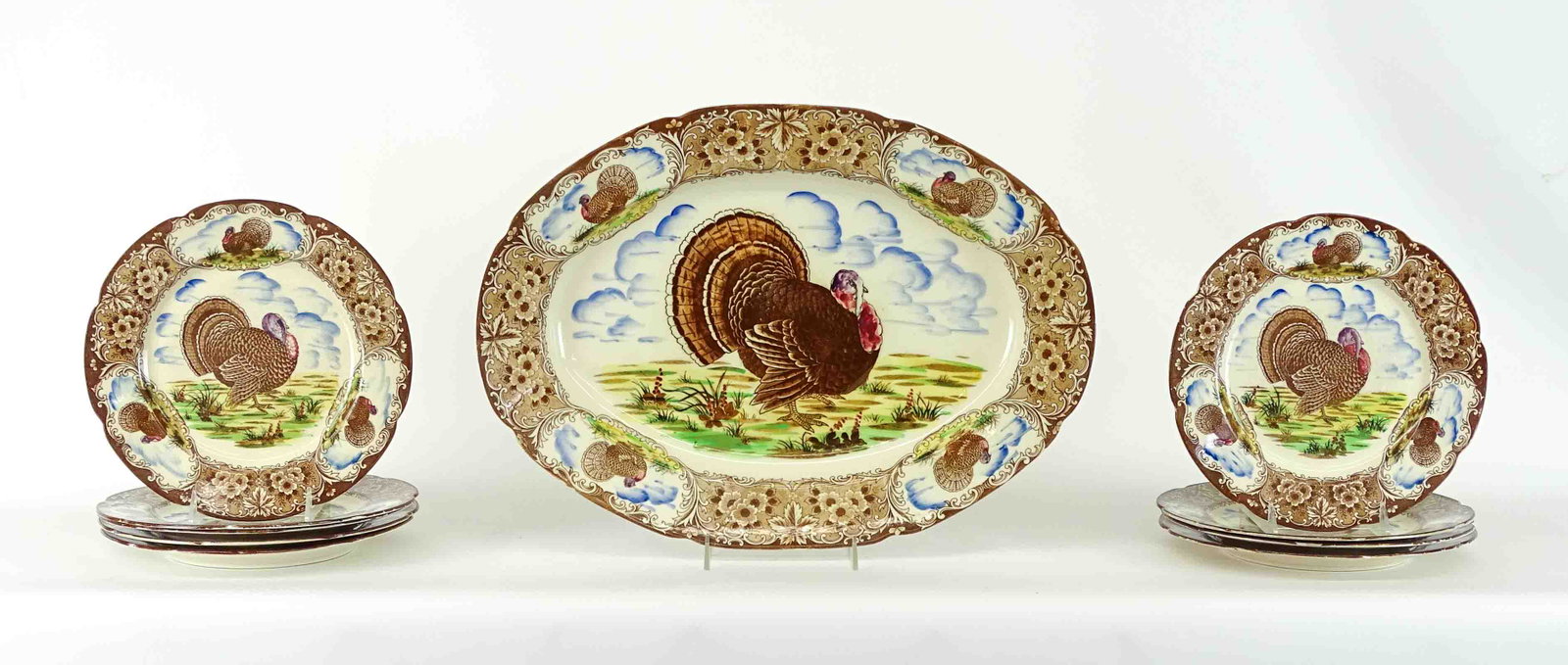Porcelain Lot: Lot including (8) Japanese turkey plates (10" D.), and 20" platter. Imperfections.