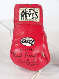 Autographed Boxing Glove: "Real Deal" Holyfield autographed boxing glove.