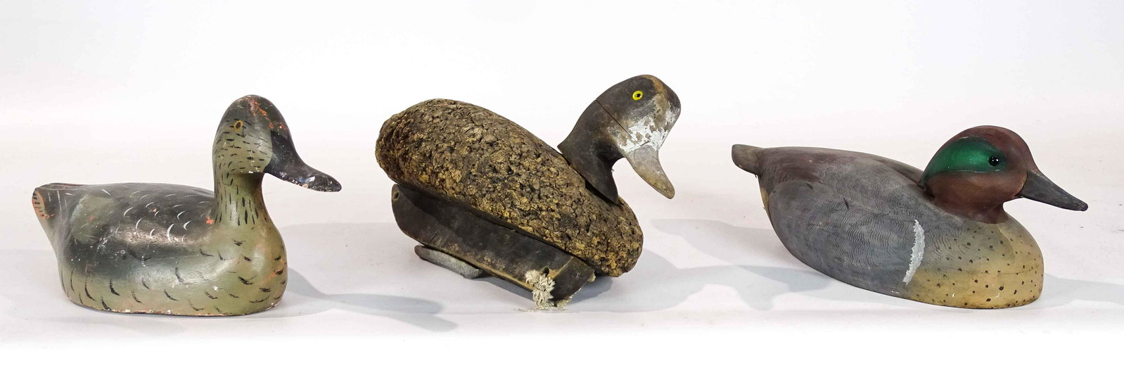 Decoy Lot: Lot (3) wooden painted decoys. Largest 14" L..