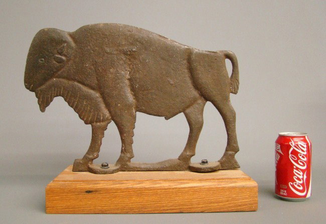 Bufalo Windmill Weight: Buffalo windmill weight. Marked "A 56". 16" W 11" Ht.