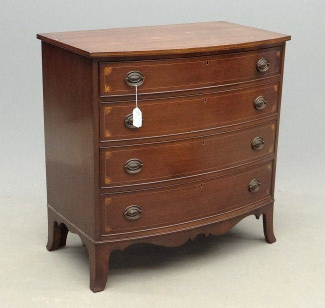 19th c. Hepplewhite Style Chest: 19th c. Centennial fan inlaid bowfront Hepplewhite style chest. 36 1/2" W 22" D 37 1/2" Ht.