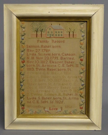 Sampler: 19th c. family record needlework. "Salmon Baker born May 27 1798.....wrought in Love 1856". Also has house and trees on top, birds and floral border. Site 14" x 10".
