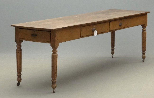 Farm Table: 19th c. 6 drawer farm table in old brown paint. top 28" x 8', 32" Ht.