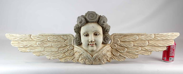 Carved Wooden Angel: Carved wooden painted Angel. 37 1/2" L..