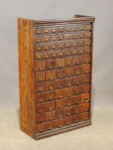 C. 1900's Card File: C. 1900's card file. 25 1/2" x 11" x 42". Wood and metal drawers.