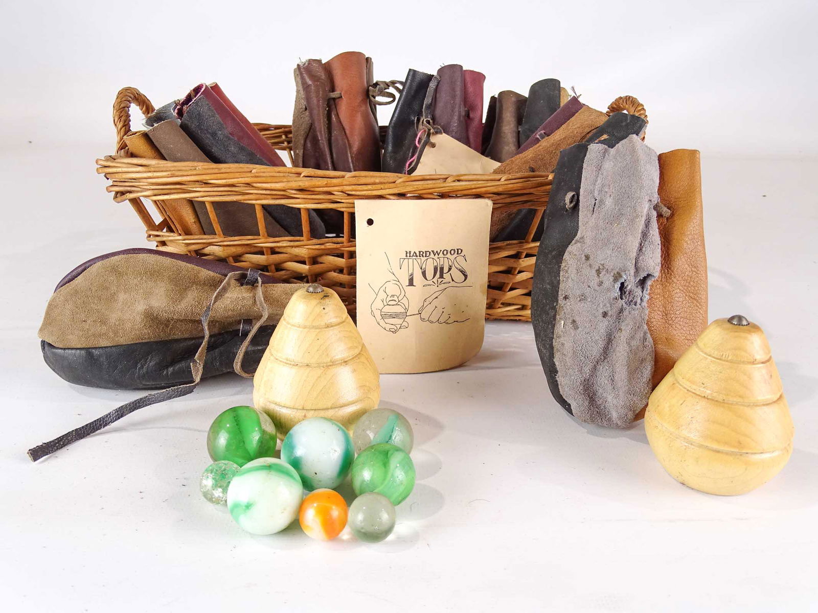 Misc. Lot: Lot including wooden spin tops and marbles.