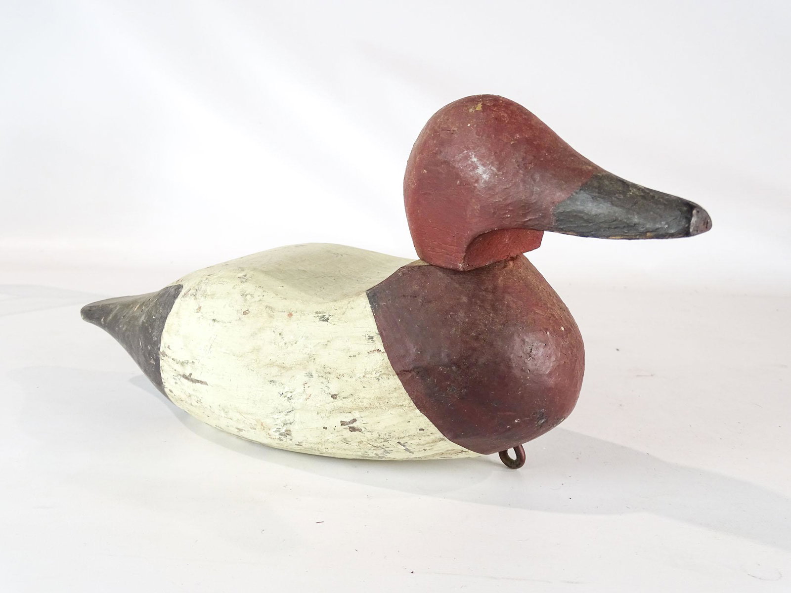 Duck Decoy: Early wooden painted duck decoy. 14 1/2" L..