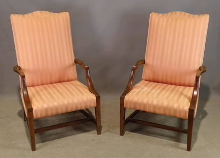 Hepplewhite Style Lolling Chairs: Two mahogany upholstered Hepplewhite style Lolling chairs. 17" seat Ht., 44 1/2" overall Ht..