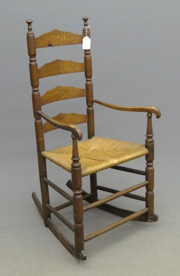 18th c. Ladderback Chair: 18th c. ladderback armed rocker. 18" Seat Ht. 43" Overall Ht.