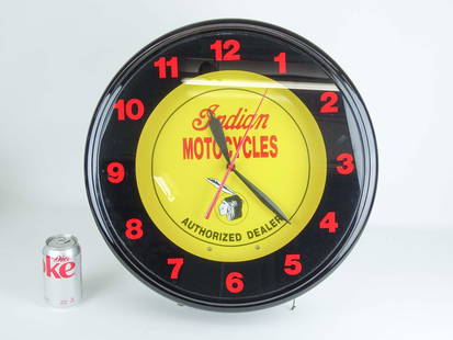 Indian Motorcycles Wall Clock: Indian Motorcycles wall clock. Working condition. 19" diameter, 5 1/2" deep.