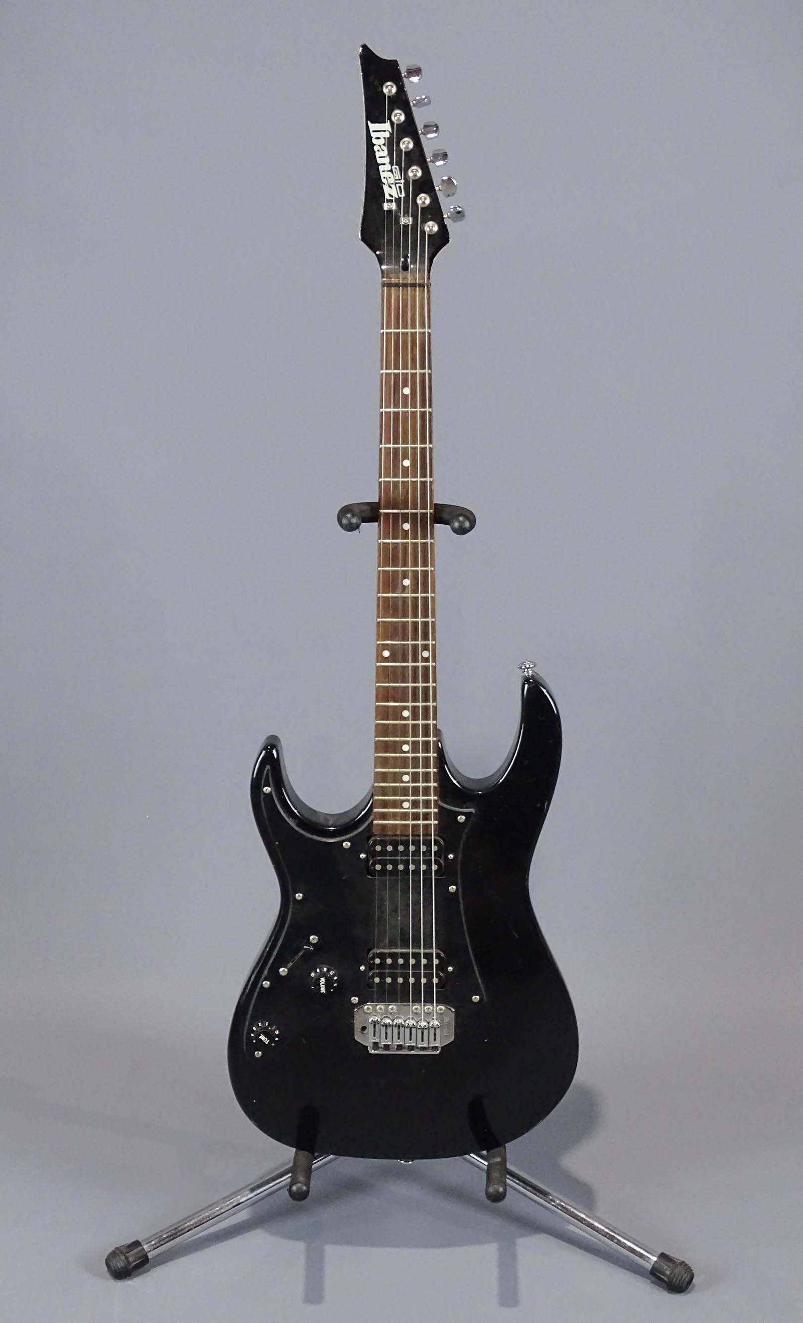 Ibanez Gio Lefties Guitar: Ibanez lefties guitar with tremolo. Made in China. Serial number A07040639. Hard shell case.