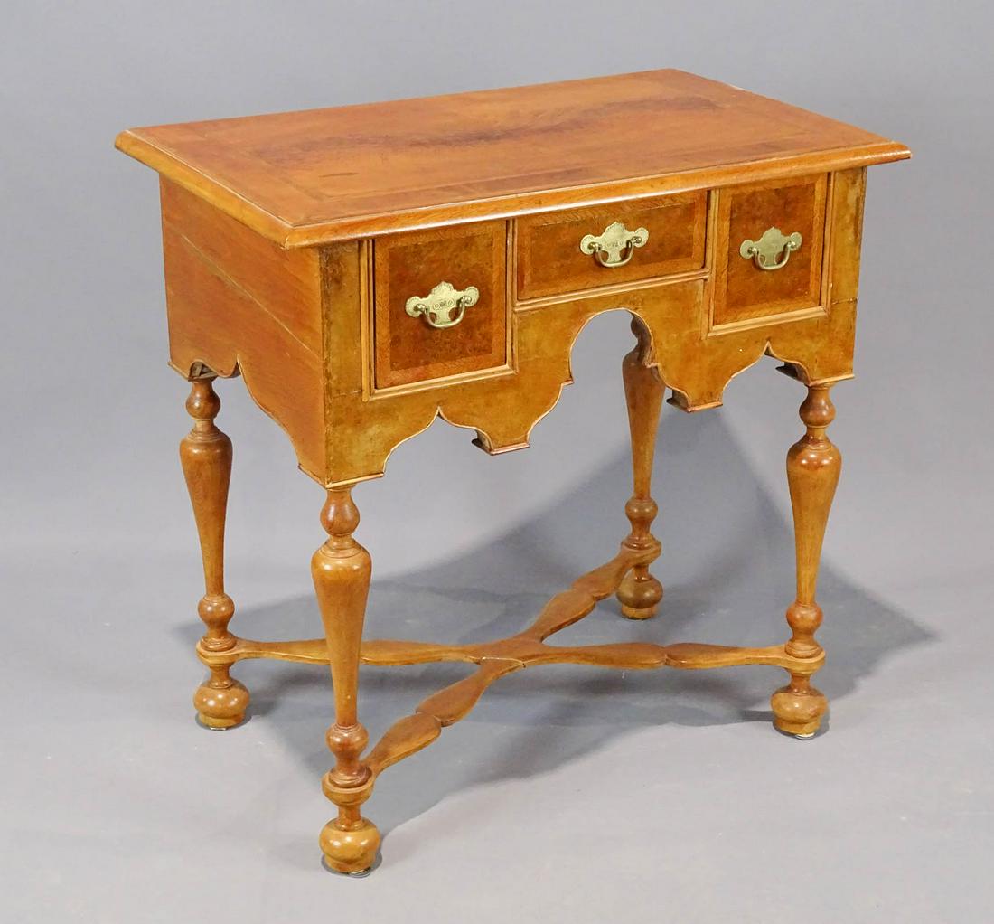 William and Mary Style Lowboy: Continental William and Mary style trumpet leg lowboy with stretcher base. Mixed woods. 29 1/2" x 17 1/2" x 29 1/2" Ht..