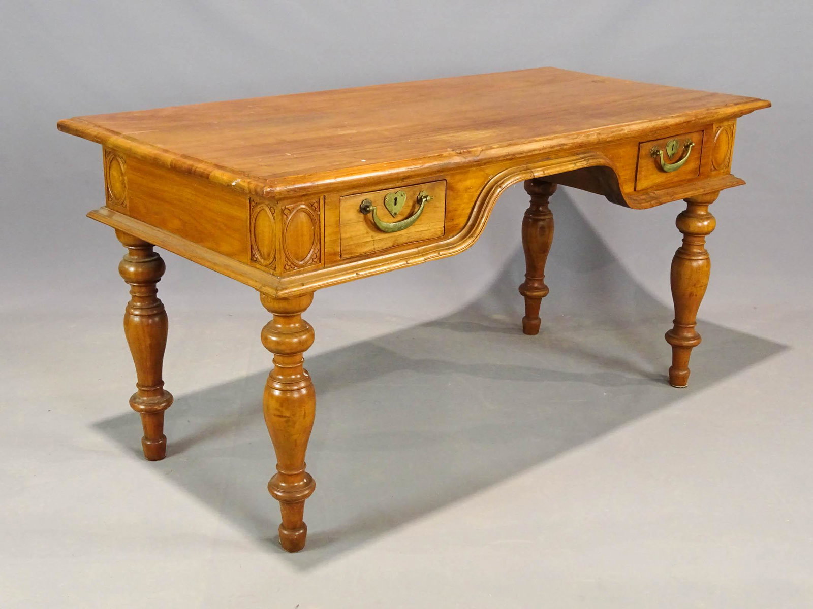 Carved Mahogany Desk: Carved mahogany desk. 58" x 27 1/2" x 30".