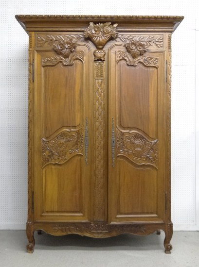 Armoire: Contemporary two door carved armoire with removable crest. Cornice 63" W 27" D 7' 5" Ht.