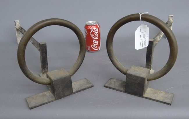 Mid Century Andirons: Pair Mid Century bronze and iron andirons. 9 1/2" Ht. 20" Length.