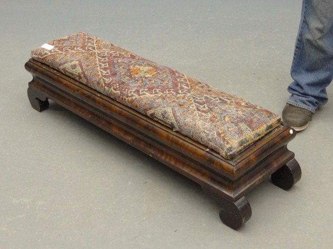 19th c. Empire Footstool: 19th c. Empire mahogany footstool. 44" W.