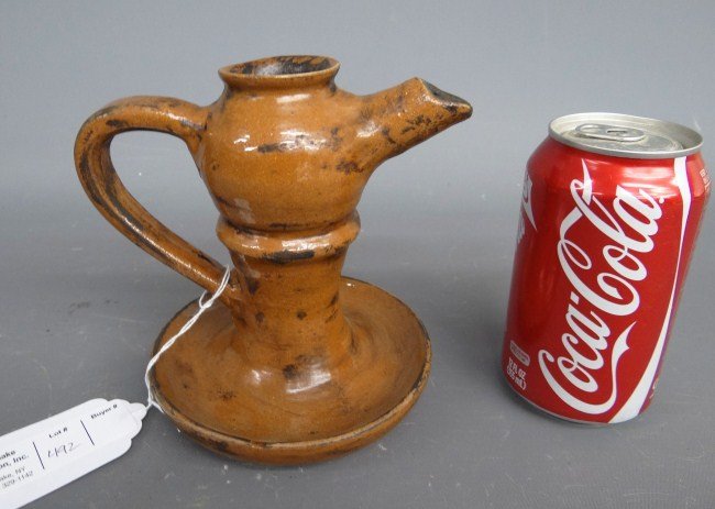 Redware Oil Lamp: Redware oil lamp. 6 1/4" Ht.