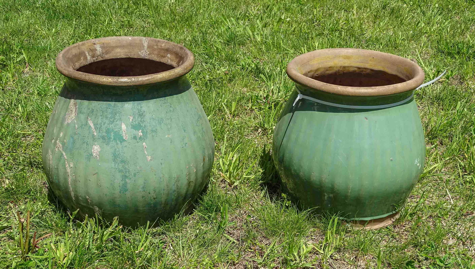 Pair of Planters: Pair of pottery planters in green. 11" Ht..