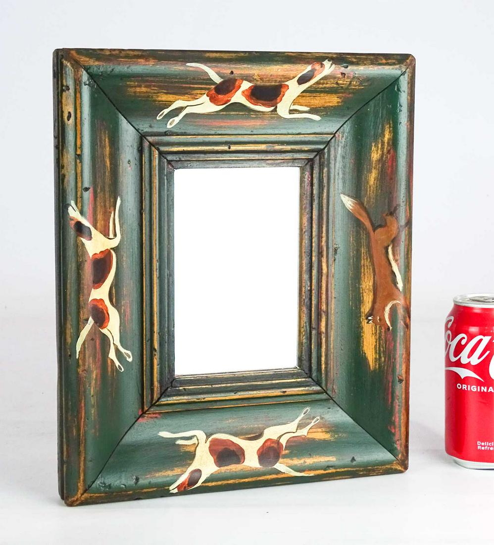 Mirror with Dog Frame: Mirror depicting a hunting scene with dogs, artist signed. 12" x 10".