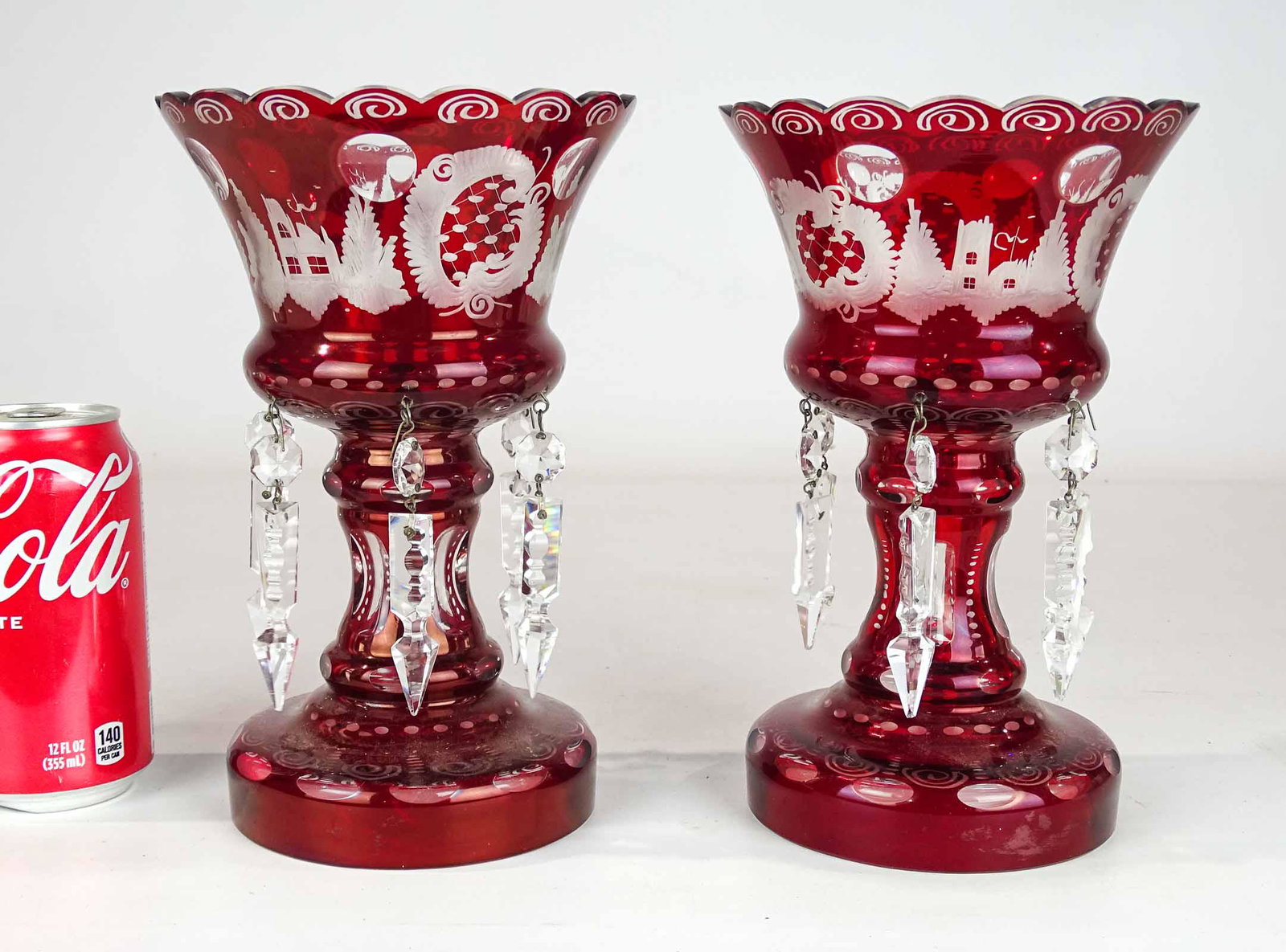 Pair Glass Lusters: Pair of 19th C. cranberry etched glass lusters with prisms. 8 3/4" Ht.