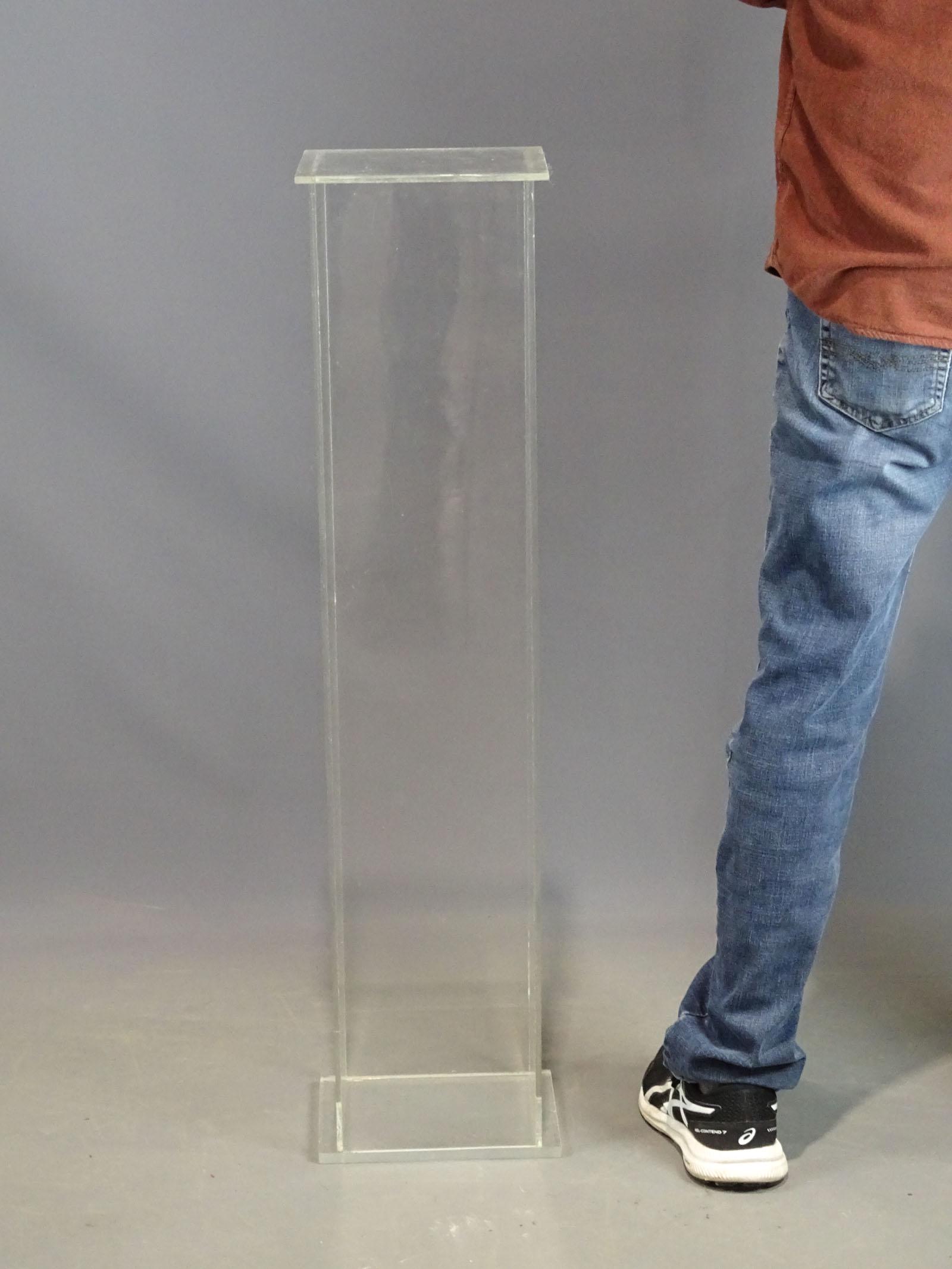 Plinth: Plexiglass plinth. 8" x 10", 40 1/2" Ht..