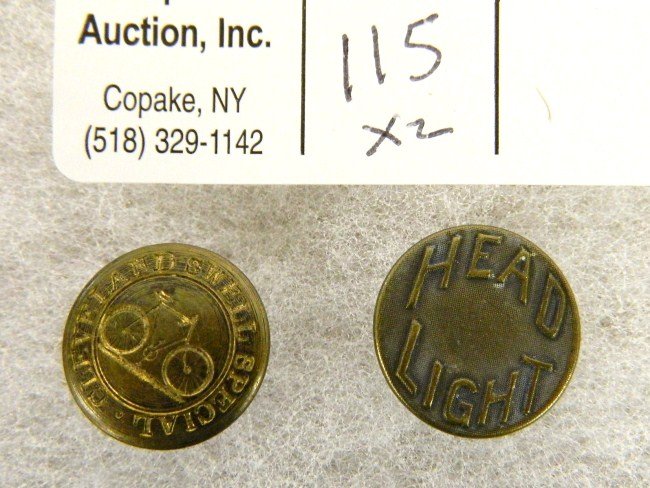 Early Bicycle Lapel Pin Lot: Rare lot of early bicycle lapel pins (brass) engraved hard tire safety "Cleveland Swell Special" and brass button "Head Light". We have never offered these examples before. VG cond.