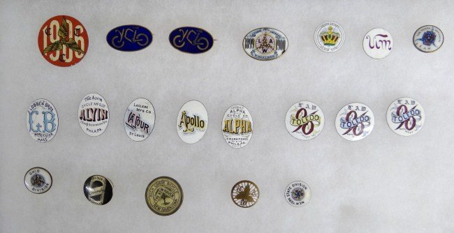 Bicycle Pin Lot: Lot of early pin back buttons and enamel discs and pin covers (without backs). Columbia Bicycles, "The Cyclo", "The New Haven", "LAW 1899 - 1900". Following covers only (no backs), (3) LAW Toledo Nati