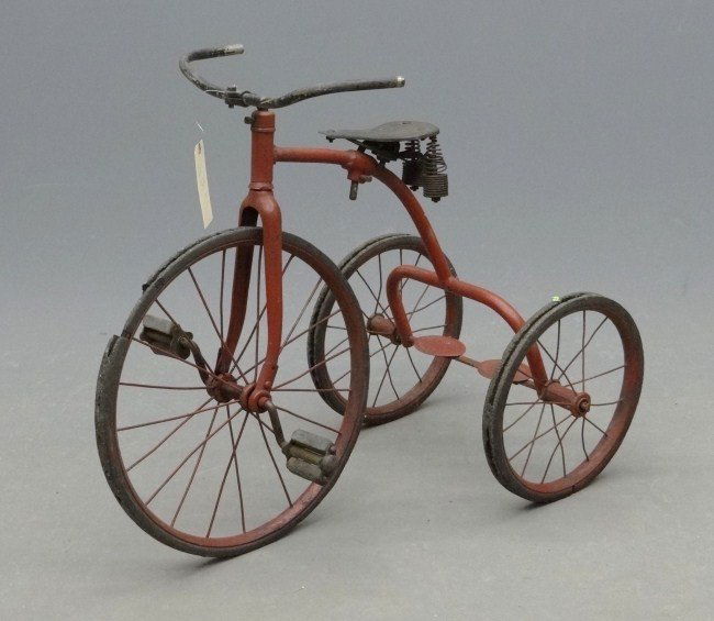 Tricycle: c. 1920 tricycle, hard tires worn saddle cover missing, needs grips. Good cond.