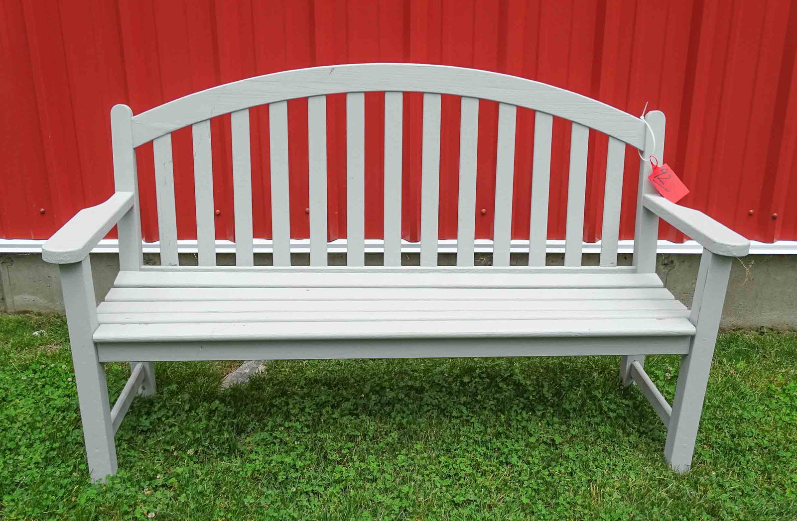 Teak Settee: Teak settee. 63" W..