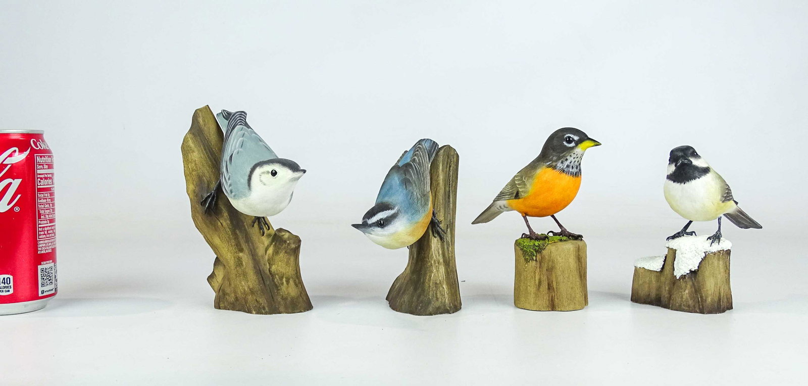 J.J. Studio Carved Birds: Lot (4) J.J. Studio carved birds. Tallest 6" Ht..
