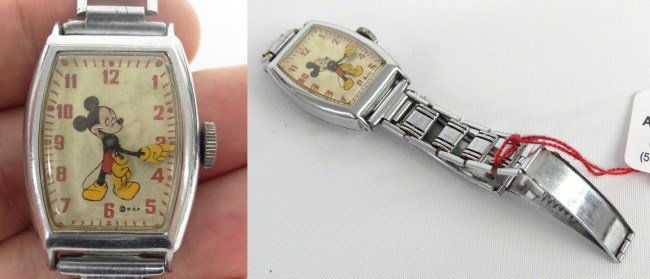 Mickey Mouse Watch: Mickey Mouse watch. Marked "US Time" on back.