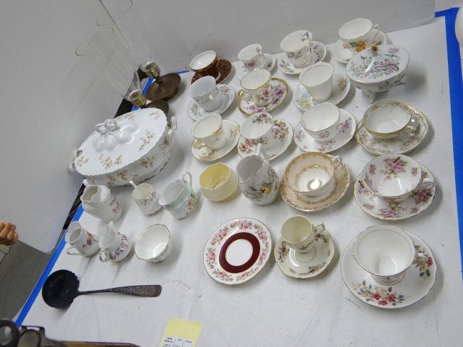Teacup Lot: Lot misc. teacups and saucers along with two hurricane lamps and Bavarian covered dish. Over 20 pcs.