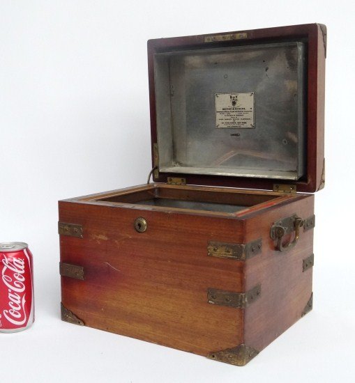 Benson & Hedges Humidor: Early 20th c. Benson & Hedges humidor. Brass bound case with side handles. 12" W 10" D 9" Ht.