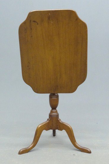 Tilt Top Candlestand: 20th c. shaped tilt top candlestand. Top 17" x 22", 24" Ht.