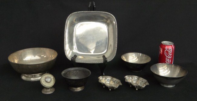 1782 Grams Tiffany Sterling Silver: Lot seven pcs. signed Tiffany sterling silver (1782 grams), along with a signed Tiffany compass (as found, not included in weight).