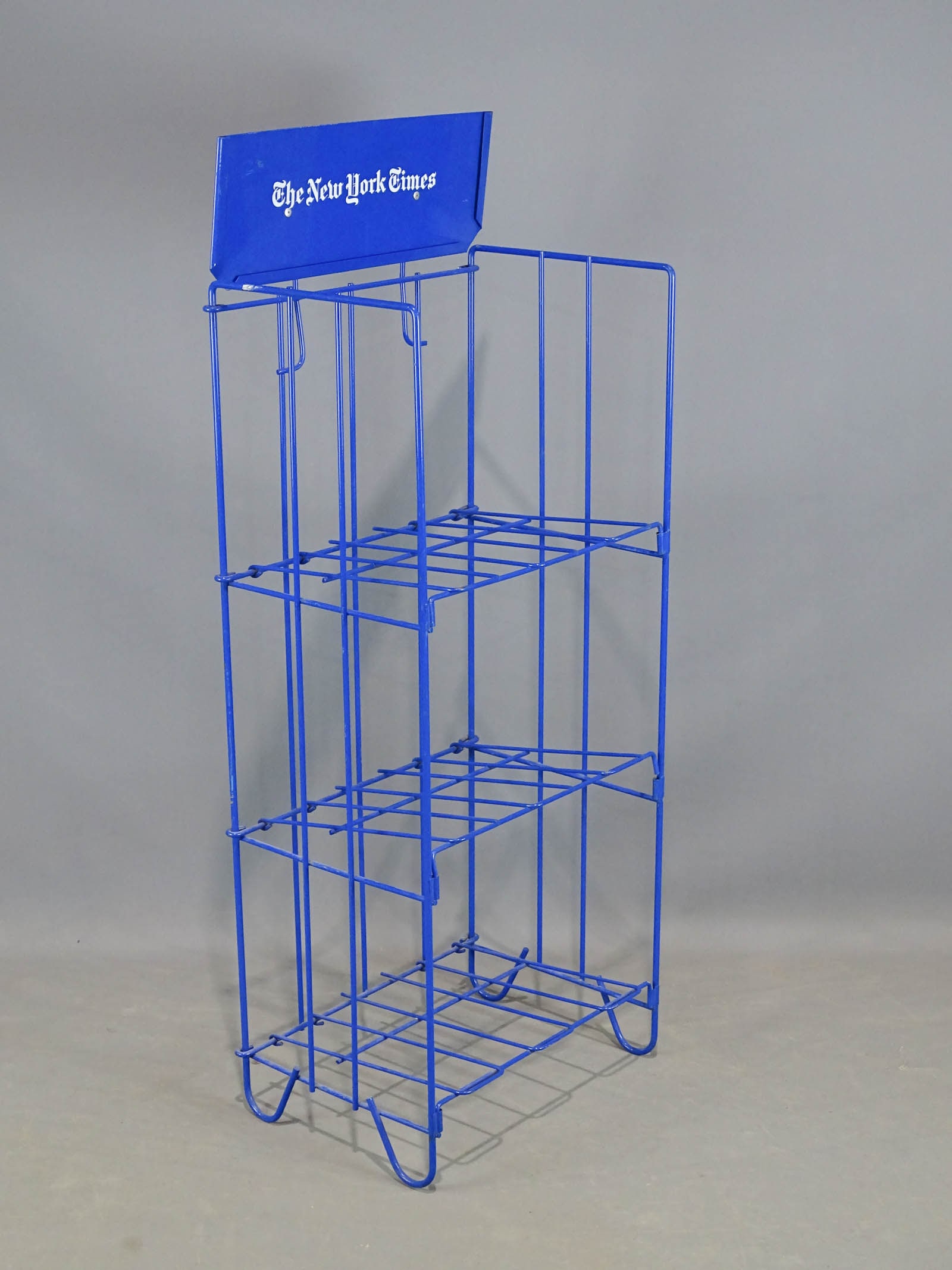 New York Times Display Stand: New York Times metal display stand. 17" x 12 1/2" x 45".